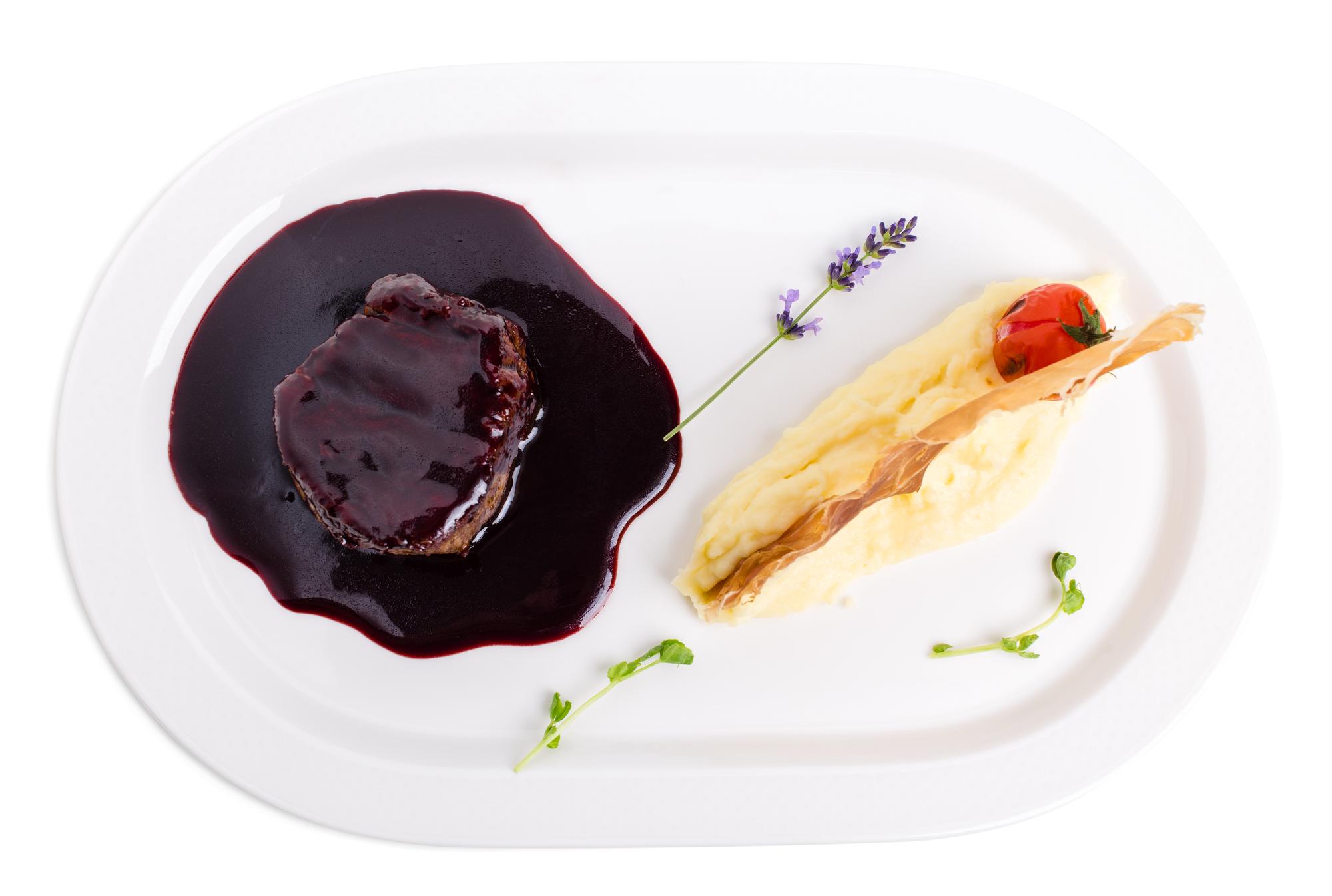 Plated dish with herbs